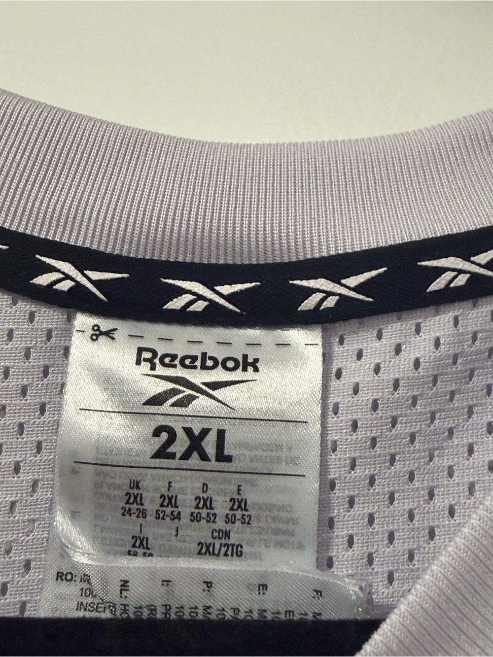 3/$20 Reebok Lavender Short Sleeve Performance Tee - Picture 2 of 3